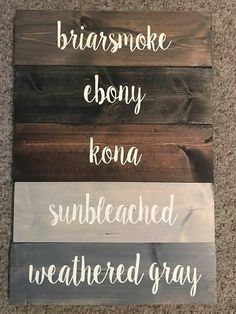 three wooden signs that say the names of different types of paint on wood planks