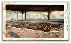 an old postcard shows the inside of a building that is being used as a museum