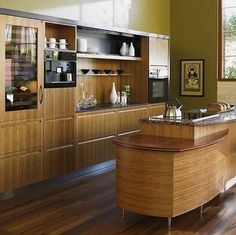 a kitchen with wooden cabinets and an island