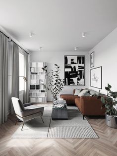 a living room filled with lots of furniture and decor on top of wooden flooring