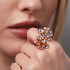 A fusion of art and elegance: Dive into a garden of color with our Desert Blooms Wildflower Split Ring! This ring isn't just jewelry; it's a burst of joy on your finger. Picture yourself wearing this stunning piece, each multi-colored sapphire petal radiating with its own unique hue. With a total of 7.12 carats of vibrant sapphires, this ring is a celebration of nature's palette.Our Desert Blooms collection draws inspiration from the resilience and beauty of wildflowers that bloom in the California desert. Just like these flowers, this ring stands as a symbol of hope and strength in adversity. The split shank design adds a modern twist to classic elegance, making it perfect for any occasion where you want to stand out with style.Don't just wear jewelry; wear a story of triumph and beauty. Finger Picture, Split Shank Ring, Hope Symbol, Ring Stand, Split Shank, Split Ring, Classic Elegance, A Garden, Types Of Metal