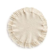 a white round rug with fringes on the top and bottom, against a white background