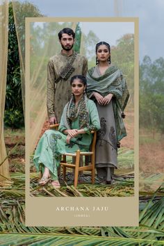 two people sitting on a chair in front of some trees and grass with the caption archana jaju