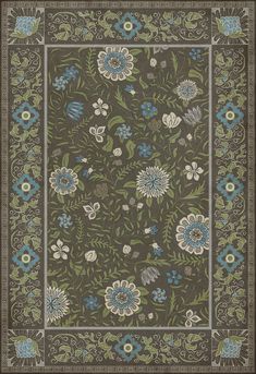 an area rug with blue flowers and green leaves on the bottom, in dark brown