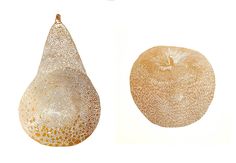 an orange and a pear are shown in this illustration, both have different patterns on them