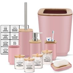 pink bathroom accessories including toothbrushes, soap dispenser and other items