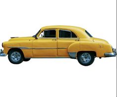 an old yellow car is shown on a white background