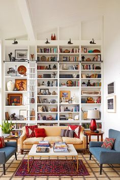 Take inspiration from these bookshelf decor ideas to add more visual appeal to your spacewhether it's a large libraryliving room or a cozy nook. High Ceiling Living Room, Built In Shelves Living Room, Bookshelves In Living Room, Built In Bookcase, Built In Shelves, Home Library