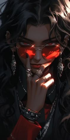 a woman wearing red glasses and holding her hand to her face