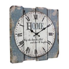 a wooden clock with roman numerals on it and the words home written below