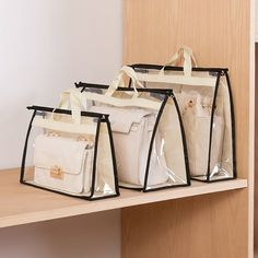 three clear bags are sitting on a shelf