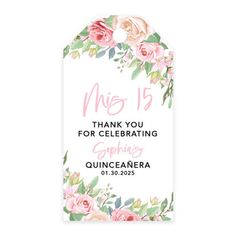 a white tag with pink flowers and greenery on the front reads, thank you for celebrating