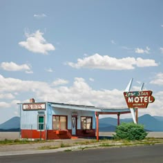 an old motel sits in the middle of nowhere