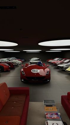 a room filled with lots of red sports cars