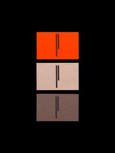 an orange and black square with two lines on it