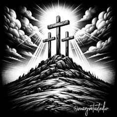 three crosses on top of a mountain with the sun shining behind them and clouds in the sky