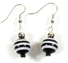 PRICES MAY VARY. These fun and funky earrings are reminiscent of a gondolier's costume in Venice! The black and white striped bead is topped with a silver-plated brass ball (6mm and tarnish-resistant)) The style is fun and funky; the striped bead is 12mm wide Stainless steel French wires are silver-plated and tarnish resistant Made at Style-ARThouse in Maryland; Comes in a nice white gift box with ARThouse logo Black and white stripes are an essential part of every wardrobe! We sell a lot of the Logo Black And White, Black And White Earrings, Striped Earrings, Funky Earrings, Black And White Stripes, French Wire, Logo Black, White Gift Boxes, White Earrings