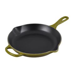 an empty cast iron skillet on a white background