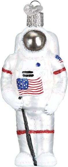 an astronaut ornament is shown in white