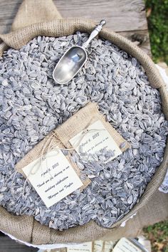 a bag full of seeds with two tags attached to it