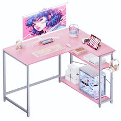 a pink desk with a computer on it