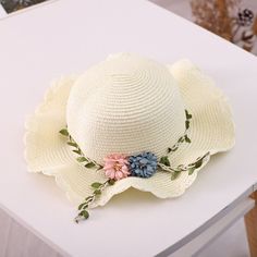 Keep your little one stylish and protected from the sun with our cute beach sun hat for kids! Made with delicate sedge material, the hat features a princess-style design that is both cute and functional. It's an essential accessory for your next beach trip and is available in a variety of colors to choose from. The hat is solidly stitched for durability and is spacious, comfortable, and easy to use. Specifications: Delicate sedge material with solid seams and stitches. Princess-style design for White Brimmed Mini Hats For Vacation, White Bucket Hat For Spring Vacation, White Wide Brim Mini Hats For Summer, White Wide Brim Mini Hat For Vacation, Summer White Wide Brim Mini Hats, Playful White Sun Hat For Summer, Playful Pink Mini Hat For Summer, White Mini Hats For Summer Vacation, White Mini Hat For Summer Vacation