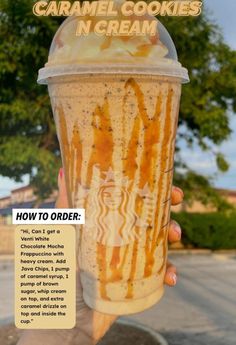 a person holding up a cup with caramel cookies in cream on the top and bottom