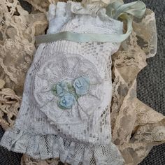 Antique Vintage Victorian White Lace RETICULE drawstring Wrist bag with Blue silk ribbonwork flowers. Satin blue grey ribbon. Frill at top and bottom. lined.. 21 x 12 cms.  Very Good condition for age. Ribbon Bag, Wrist Bag, Grey Ribbon, Victorian Lace, Vintage Ribbon, Vintage Victorian, Purse Pouch, Blue Silk, Coin Purses