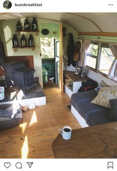 a living room filled with furniture and a fire place