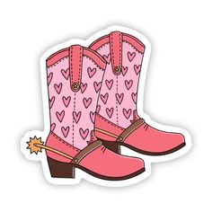 a pair of pink cowboy boots with hearts on them