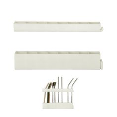 two white shelfs with metal utensils in them on a white background,