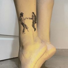 a person with a tattoo on their foot