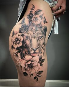 Black and grey lion and flowers tattoo Lion Tattoo On Thigh, Thigh Piece Tattoos, Font Tato, Lioness Tattoo, Hip Thigh Tattoos, Hip Tattoos Women, Dope Tattoos For Women, Cute Tattoos For Women