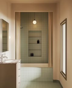 an empty bathroom with two sinks and mirrors