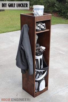 a wooden shelf with golf clubs and balls in it on the sidewalk near some trees