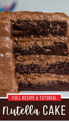 a close up of a slice of cake with chocolate frosting on the top and bottom