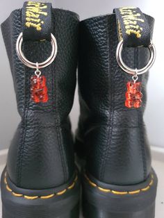 Handmade gummy bear boot charms, come in a pair  Perfect for Doc Martens  Available in multiple colours All boot charms can be purchased as a pair or individually, perfect for mix 'n' matching! Charm dimensions: 1.2cm x 1.8cm Custom Boots Diy, Boot Chains, Style Finder, Boot Jewelry, Decorated Shoes, Shoe Charms, Doc Martens, Gummy Bears, Shoe Clips