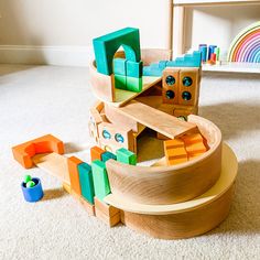 a child's play area with toys on the floor