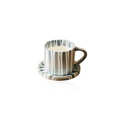 a striped cup and saucer on a white background