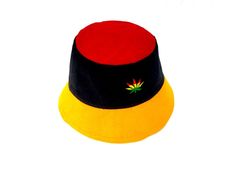 This Rasta Jamaican Bucket hat is perfect for Summer Reggae Festivals. This solid Bucket hat features a Jamaican Rasta Inspired Striped Band atop a solid , Red green yellow Rasta color bucket hat. Rock this hat as you dance the night away at your next outdoor concert or event. Fashionable and a must-have . This Hat is unisex that looks great on both men and women . This Hat is very durable and can be used as a special gift . -Solid Unisex Jamaican Adult Sun Hat -Rasta Reggae Inspired Striped Ban Red Brimmed Festival Costume Hats And Headpieces, Red Brimmed Costume Hat For Festival, Red Brimmed Festival Costume Hat, Red Brimmed Costume Hats And Headpieces For Festivals, Red Mini Cap For Beach, Red Bucket Hat For Festivals, Red Cap-shaped Sun Hat, Adjustable Red Bucket Hat, Red Wide Brim Bucket Hat For Festival