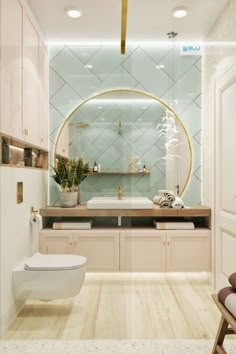 a bathroom with a white toilet sitting next to a sink