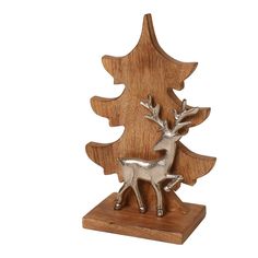 a metal deer figurine sitting on top of a wooden stand