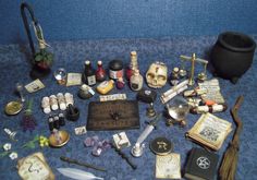 there are many items on the table including books, keys and other things to make it look like they have been placed together