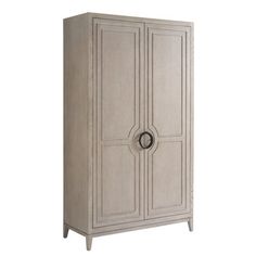 an armoire with two doors on one side and a round handle on the other