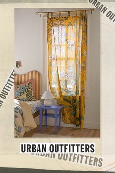 an image of a bedroom with yellow curtains