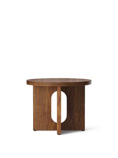 a wooden table with an oval shaped top and two small holes in the center, on a white background