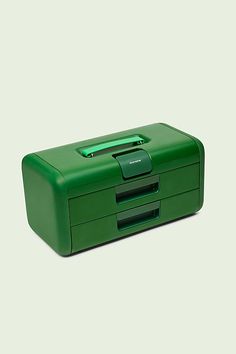 a green box with two batteries in it