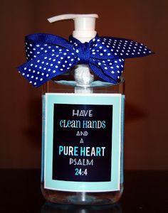 a hand soap bottle with a blue bow on it