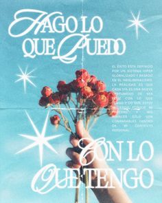 a person holding flowers in their hand with the words agolio que que quied on it