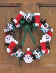 a christmas wreath is hanging on the front door